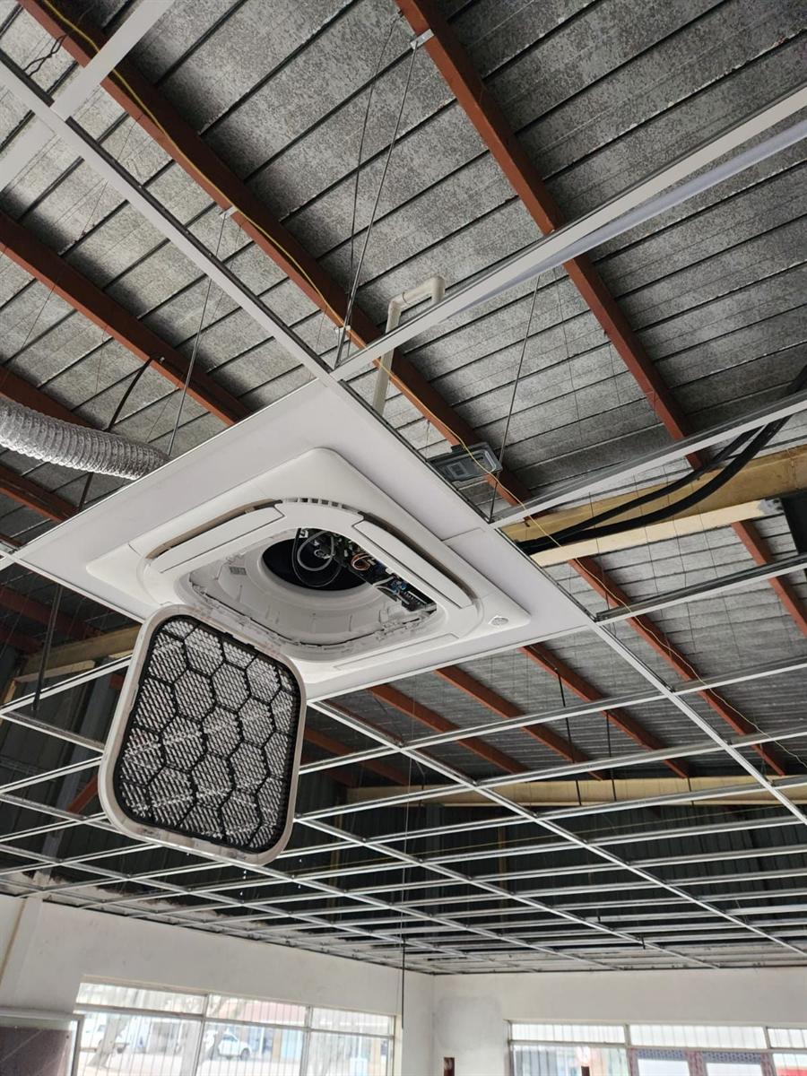 Ceiling cassette filter dropped down for servicing