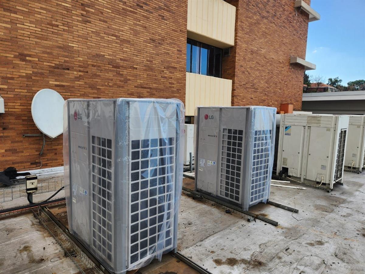 LG Multi V VRF condensers installed on a rooftop plant deck